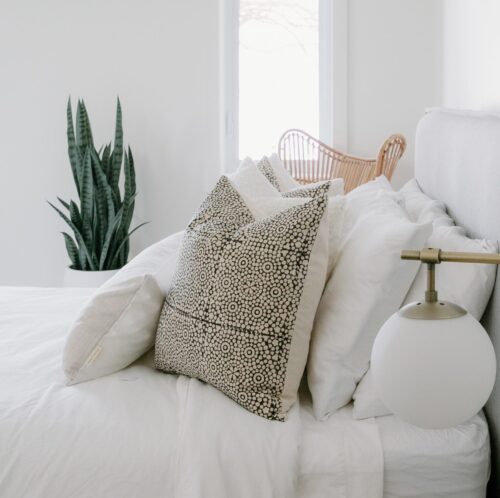 black and cream geometric pillow