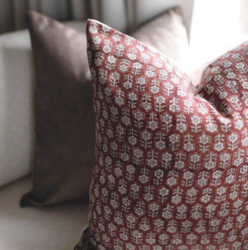 rust floral block print pillow